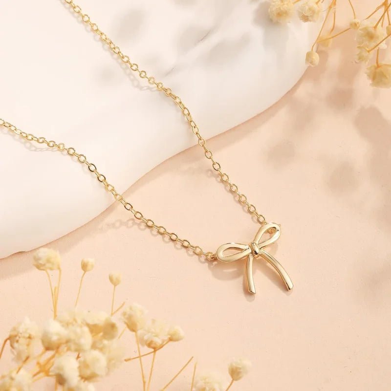 Collier délicat à nœud en or 14 carats pour femmes, maman, adolescentes, mignon, petit pendentif à nœud, ras du cou, chaîne, bijoux cadeaux pour elle - crazyfinds.frcrazyfinds.frGold NecklaceCollier délicat à nœud en or 14 carats pour femmes, maman, adolescentes, mignon, petit pendentif à nœud, ras du cou, chaîne, bijoux cadeaux pour elle